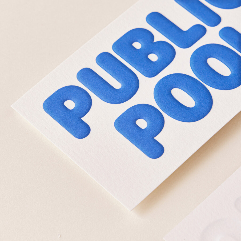 Public Pool Business Cards Close Up - Dome Emboss Finishing